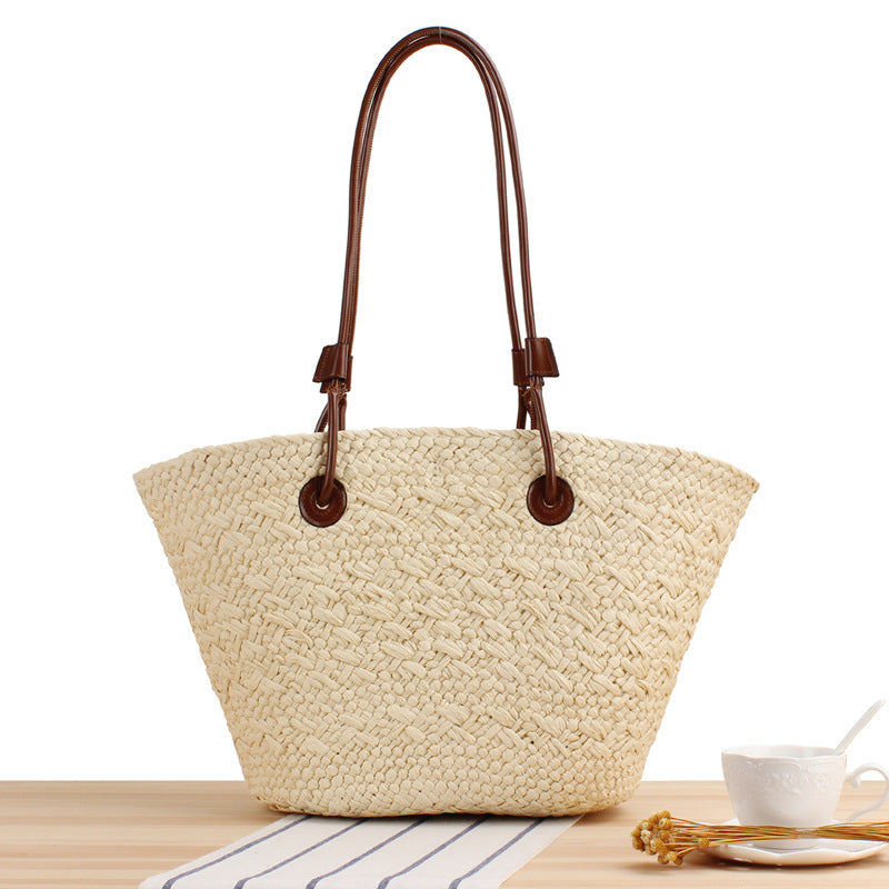 Beach bag made of high-quality braided straw with stylish leather handles Kalsten