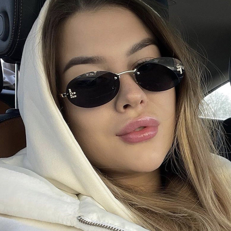 Women's fashionable sunglasses with elegant, round lenses and delicate metal frame Kalsten