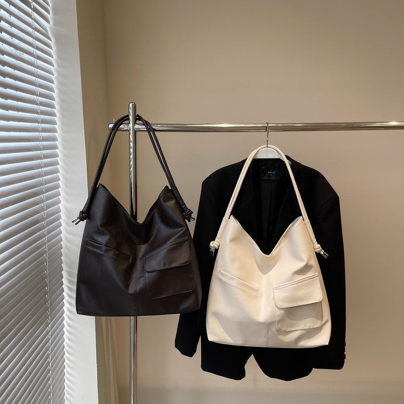 Casual tote bag with practical front pockets Kalsten