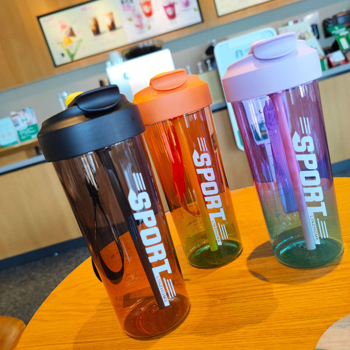 Women's sports water bottle with practical straw and carry function Kalsten