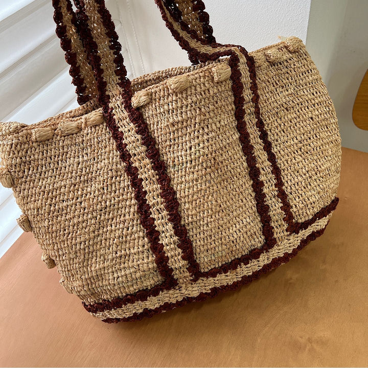 Braided shoulder bag with floral motif Kalsten