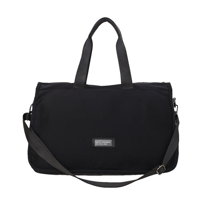 Sporty travel bag with ergonomic carrying handles and versatile compartments Kalsten