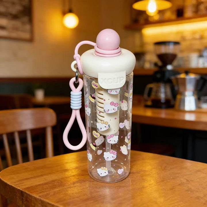 Women's water bottle with cheerful design and practical carrying handle Kalsten
