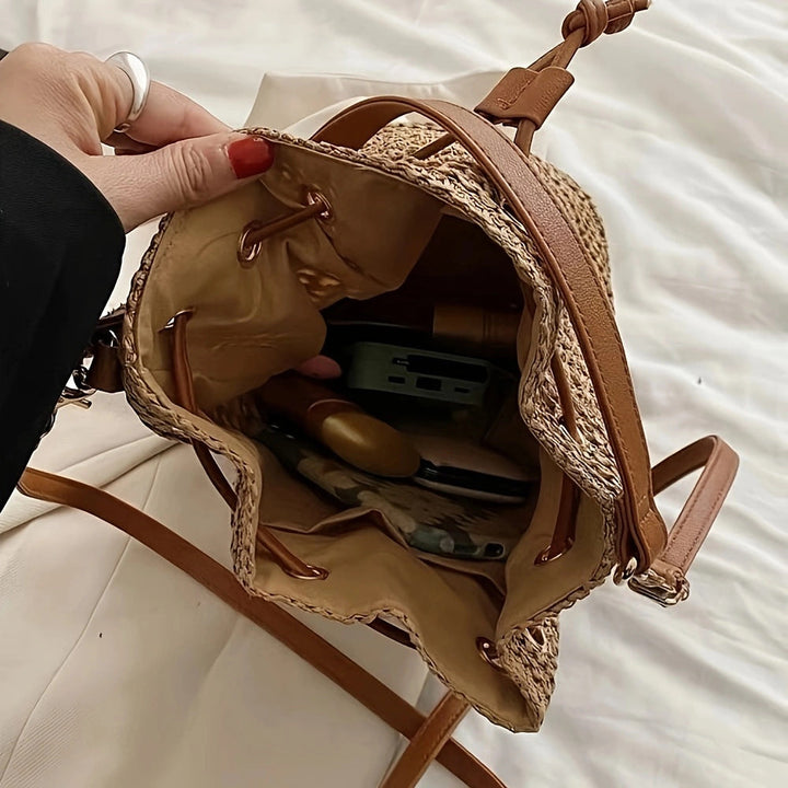 Elegant Handbag Made of Braided Natural Material with Stylish Drawstring Closure Kalsten