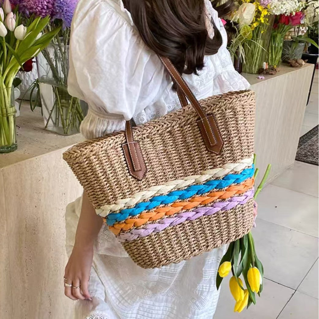 Shoulder bag made of braided material with colorful detail Kalsten