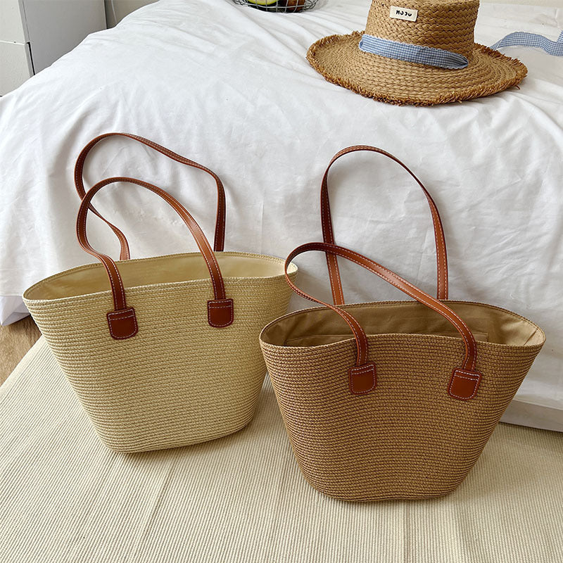 Classic straw bag with leather accents Kalsten