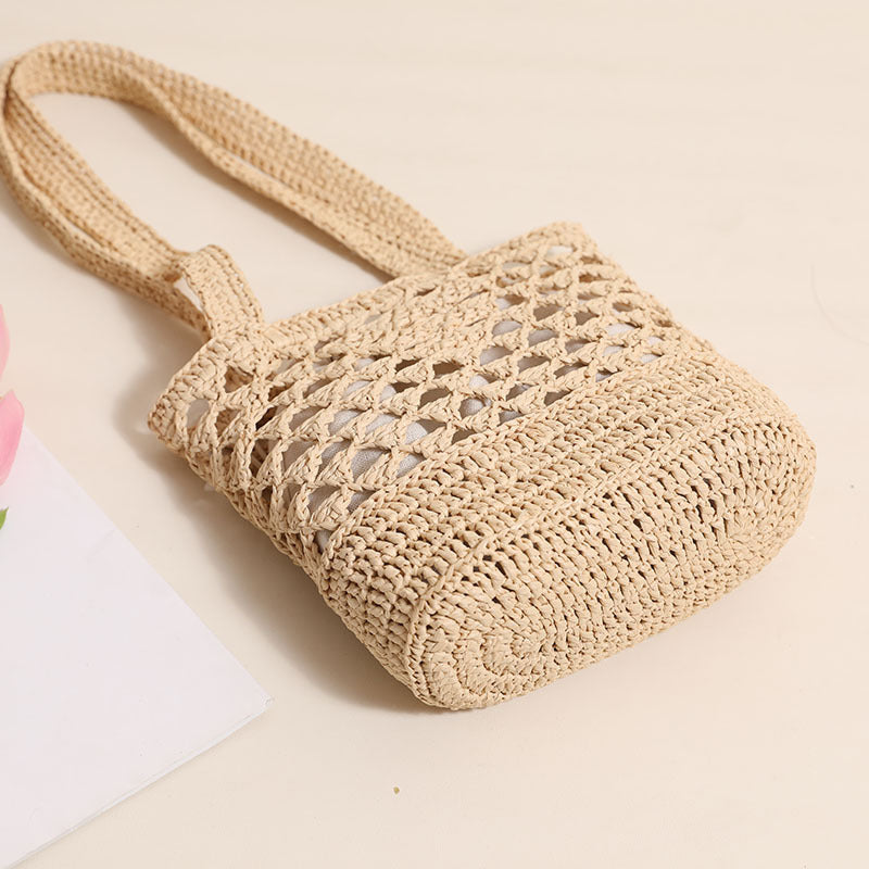 Handcrafted net straw bag with elegant straps Kalsten