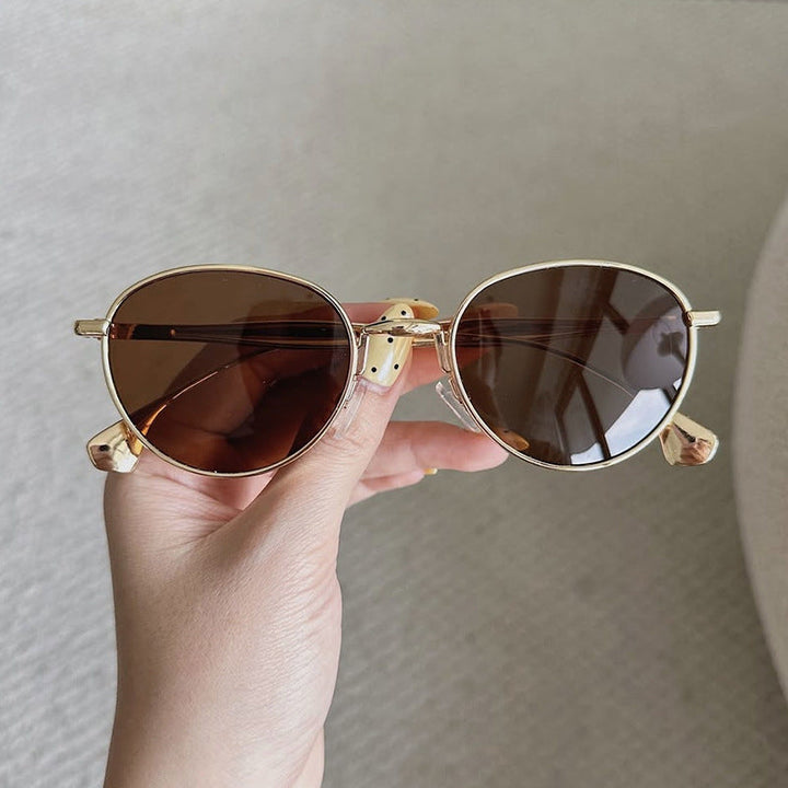 Women's round sunglasses with elegant metal frame and UV protection Kalsten