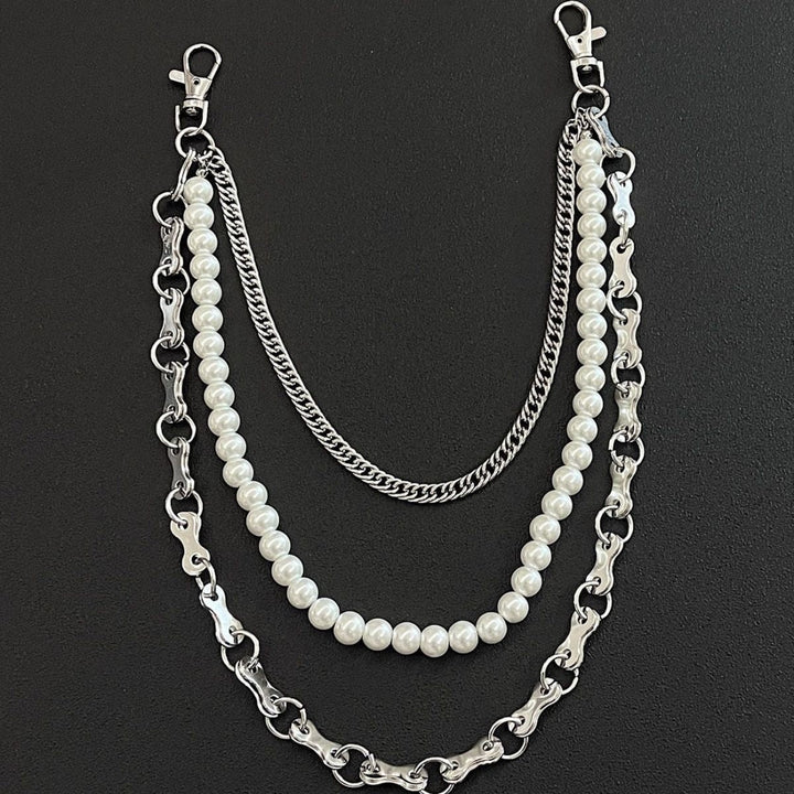 Fashionable chain bracelet with pearls and metal links Kalsten