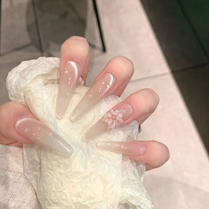 Elegant Stiletto Nail Extensions with Floral Accents Acalora
