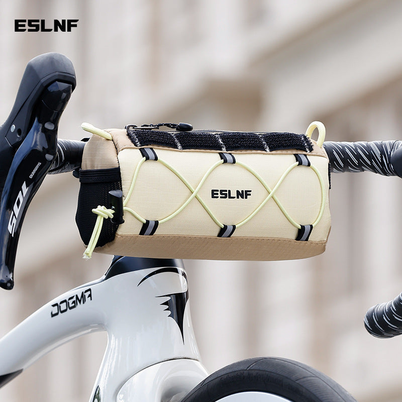 compact cylindrical handlebar bag with elastic bungee and universal Velcro mount Kalsten