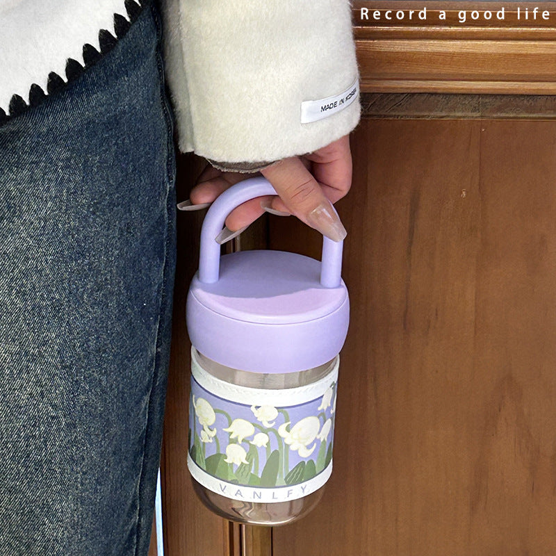 Women's insulated drinking bottle with ergonomic carrying handle and elegant flower design Kalsten