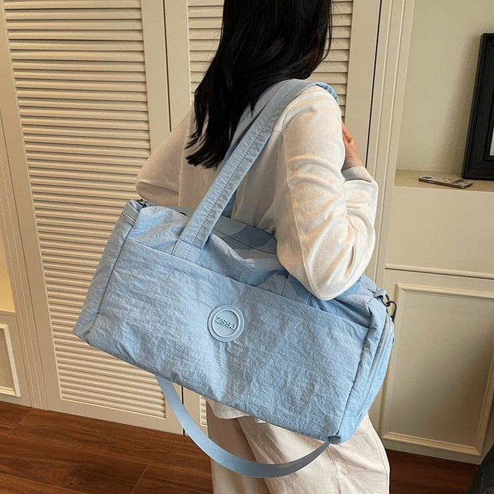 Sporty travel bag with practical exterior pockets Kalsten