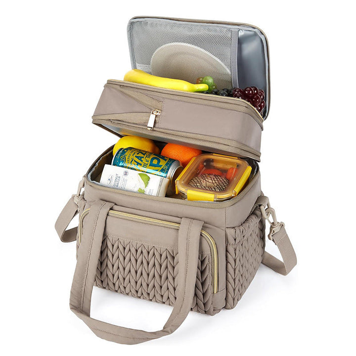 Insulated picnic bag with multi-layered interior compartment and practical carrying system Kalsten
