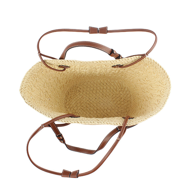 Elegant handbag made of woven natural material with sturdy leather handles Kalsten