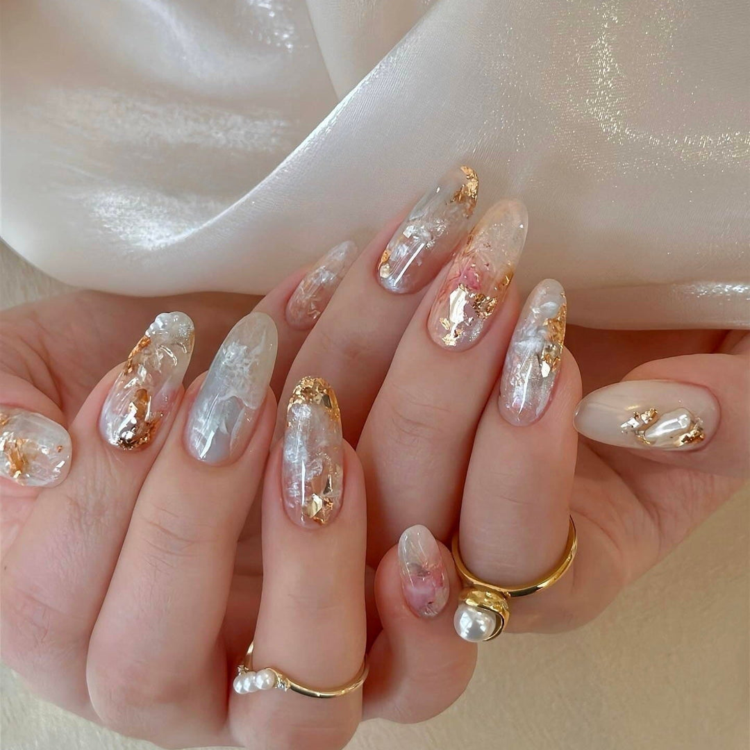 Artificial nails with glamorous metallic details and sparkling design Kalsten