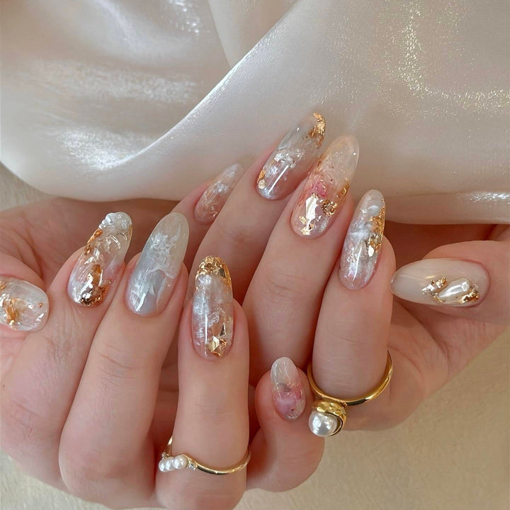 Artificial nails with glamorous metallic details and sparkling design Kalsten