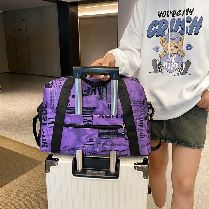 Sporty travel bag with playful elephant pattern Kalsten