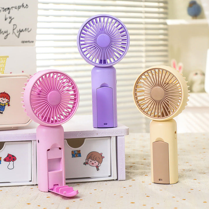 Women portable mini hand fan with USB charging function and ergonomic design Kalsten