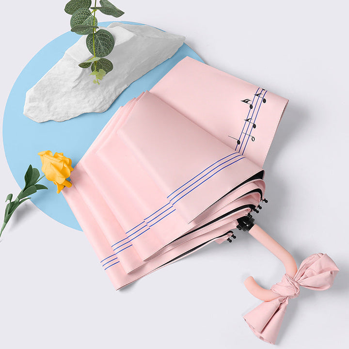 Ladies elegant folding umbrella with heart-shaped design Kalsten