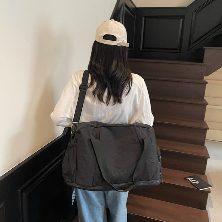 Sporty travel bag with practical outer pockets Kalsten