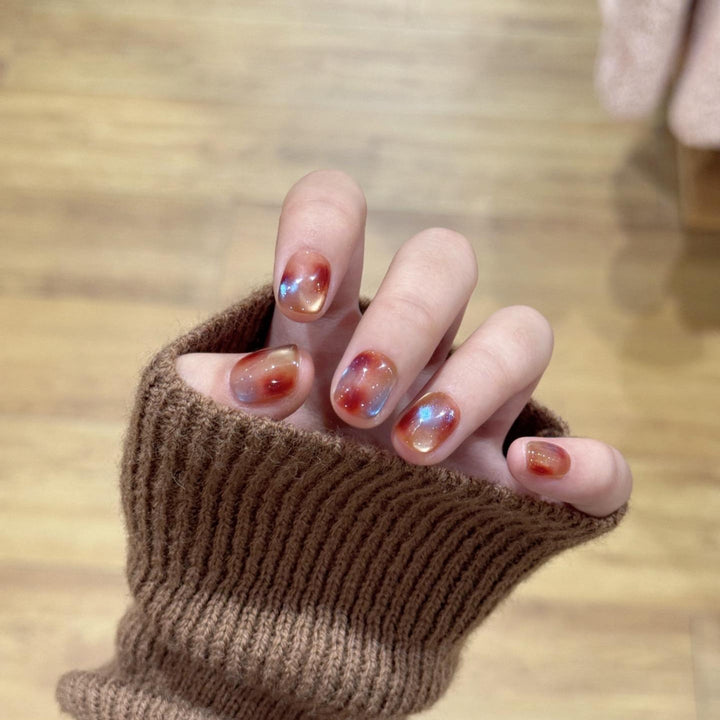 Artificial nails with shimmering galaxy patterns Kalsten