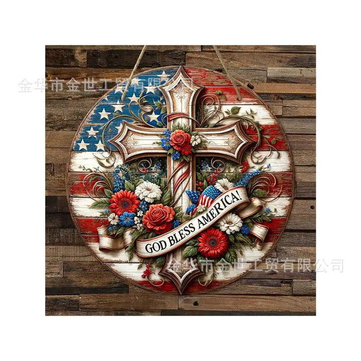 Independence Day rustic round wooden patriotic cross wall plaque with floral accents and God Bless America banner Kalsten