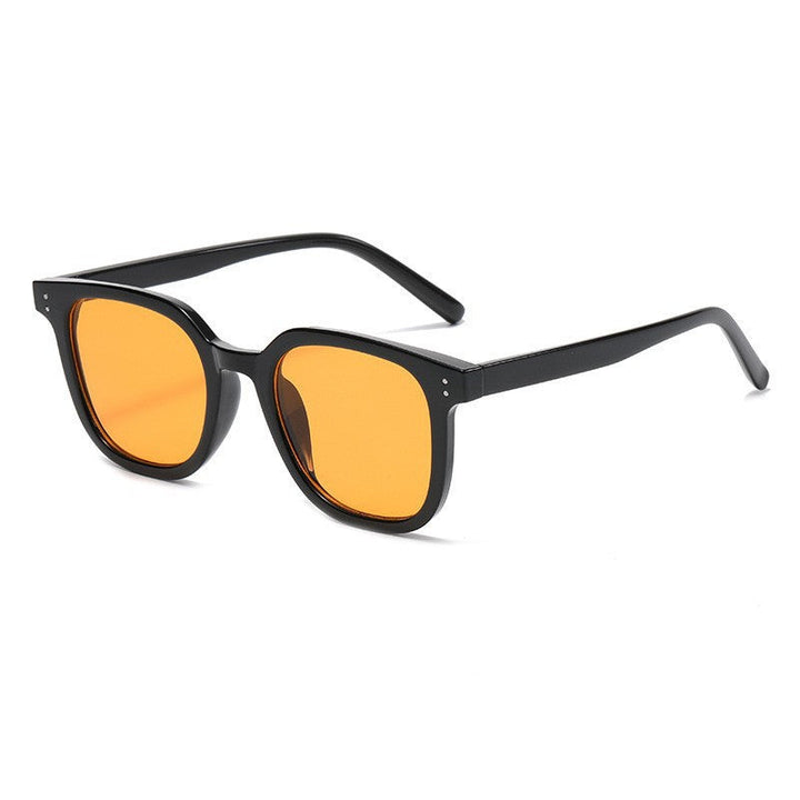 Women striking retro sunglasses with yellow-tinted lenses Kalsten