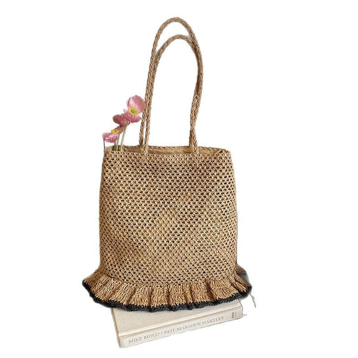 Handcrafted straw bag with fringed hem Kalsten