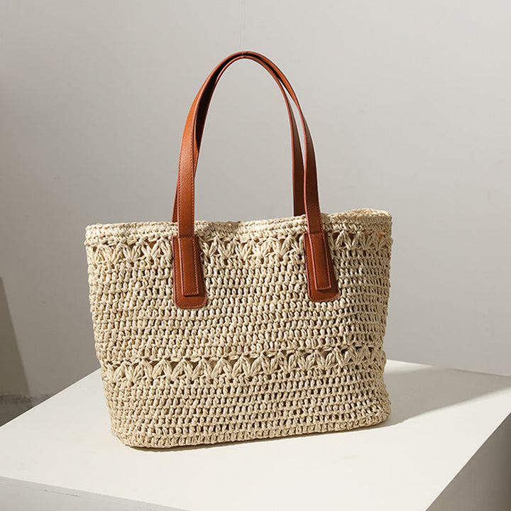 Braided straw bag with sturdy leather handles Kalsten