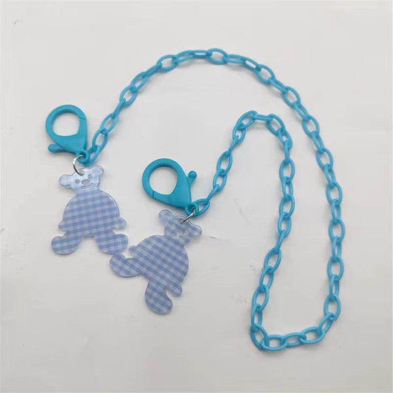 Glasses strap made of transparent resin with rainbow pendant Kalsten