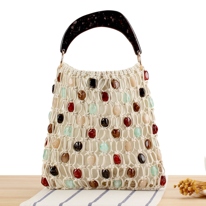 Fashionable handbag in creative net design with colorful accents Kalsten
