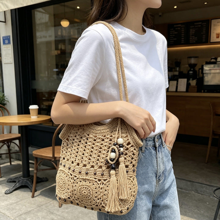 Hand-crocheted shoulder bag with unique fringe design Kalsten