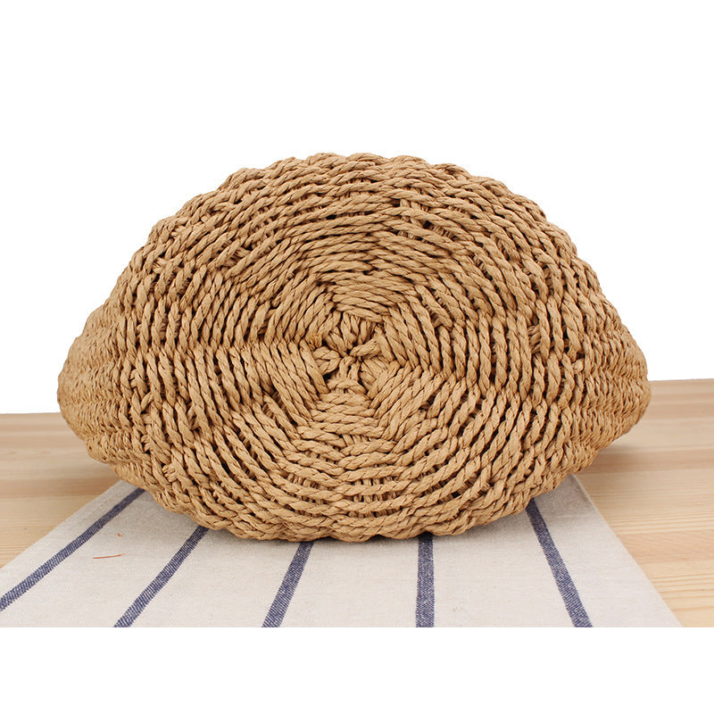 Basket bag made of woven natural material with leather handles Kalsten