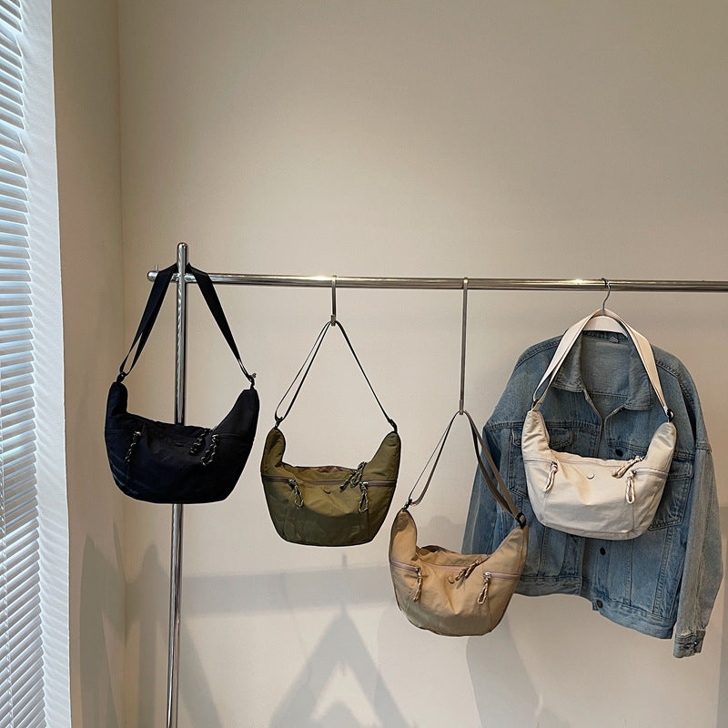 Practical shoulder bag with external zip pockets Kalsten
