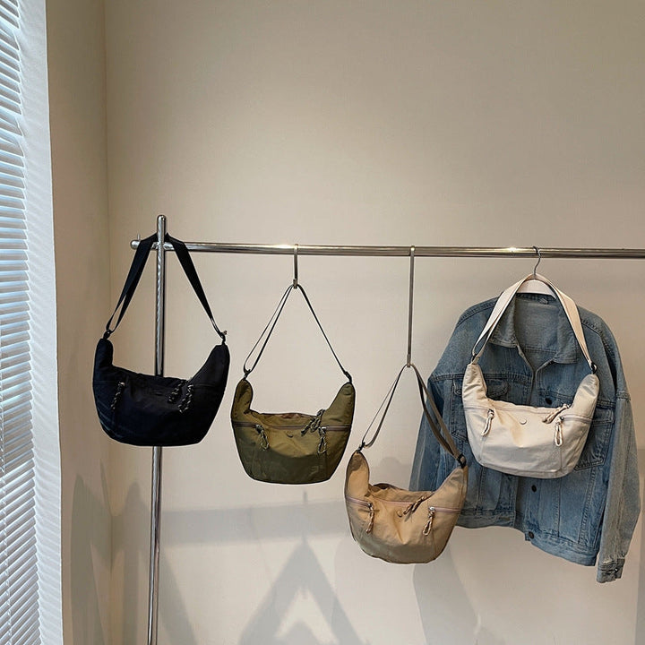 Practical shoulder bag with external zip pockets Kalsten