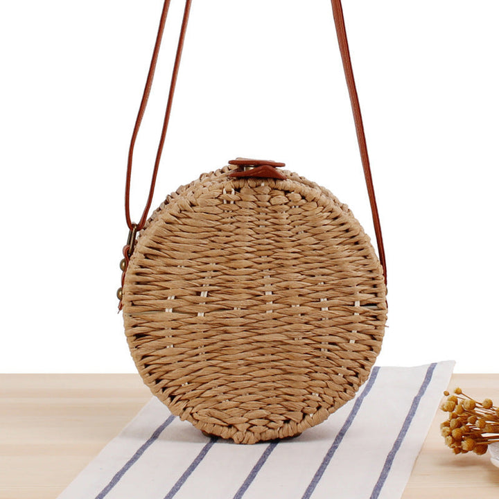 Round basket bag with leather accents Kalsten