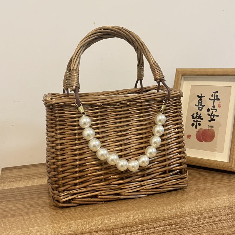 Ladies' basket bag with decorative pearl accents and bow decoration Kalsten