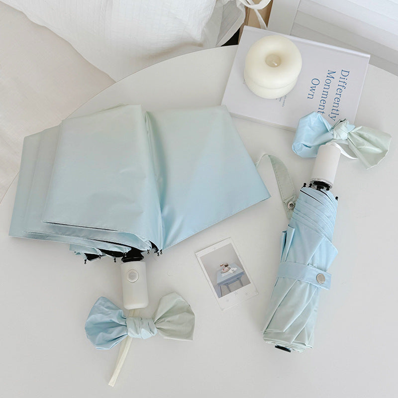 Women's Folding Travel Umbrella with Practical Storage System Kalsten