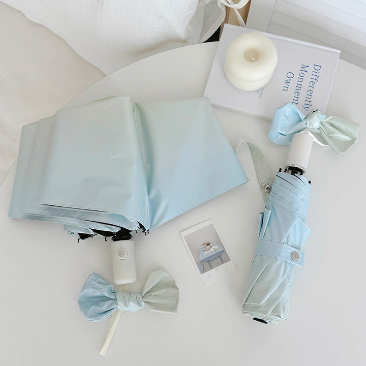 Women's Folding Travel Umbrella with Practical Storage System Kalsten