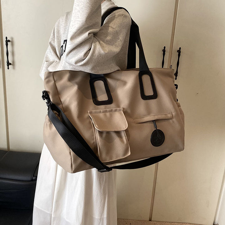 Multifunctional leisure bag with sturdy carrying handles and many compartments Kalsten