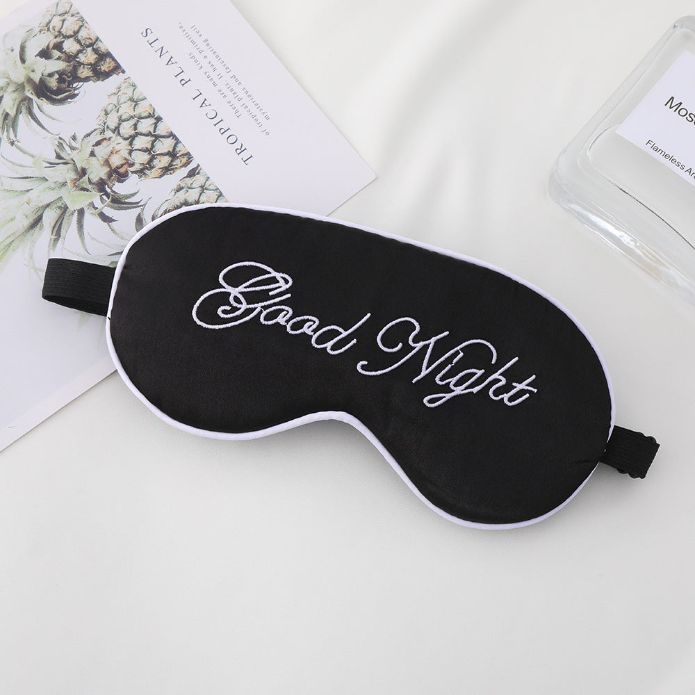 Unisex embroidered contoured sleep mask with decorative text embroidery and adjustable elastic band Kalsten