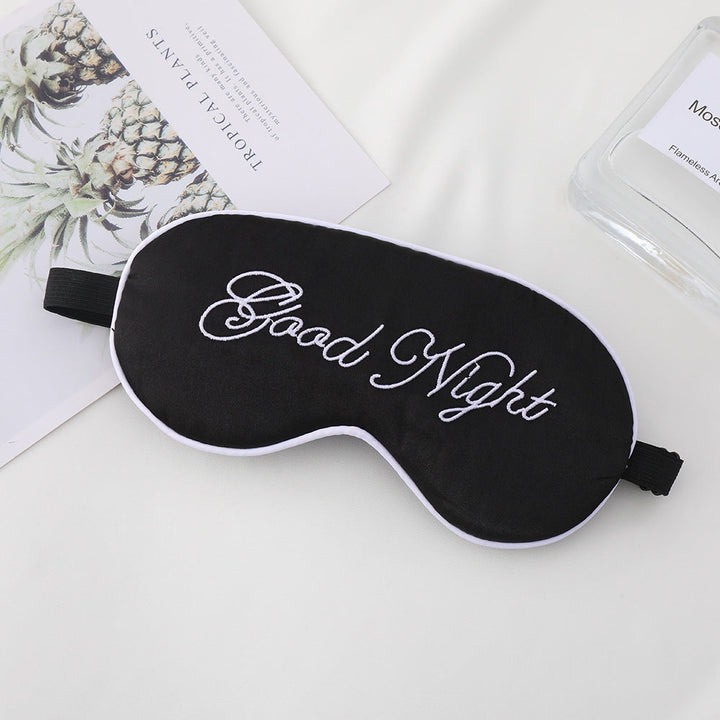 Unisex embroidered contoured sleep mask with decorative text embroidery and adjustable elastic band Kalsten