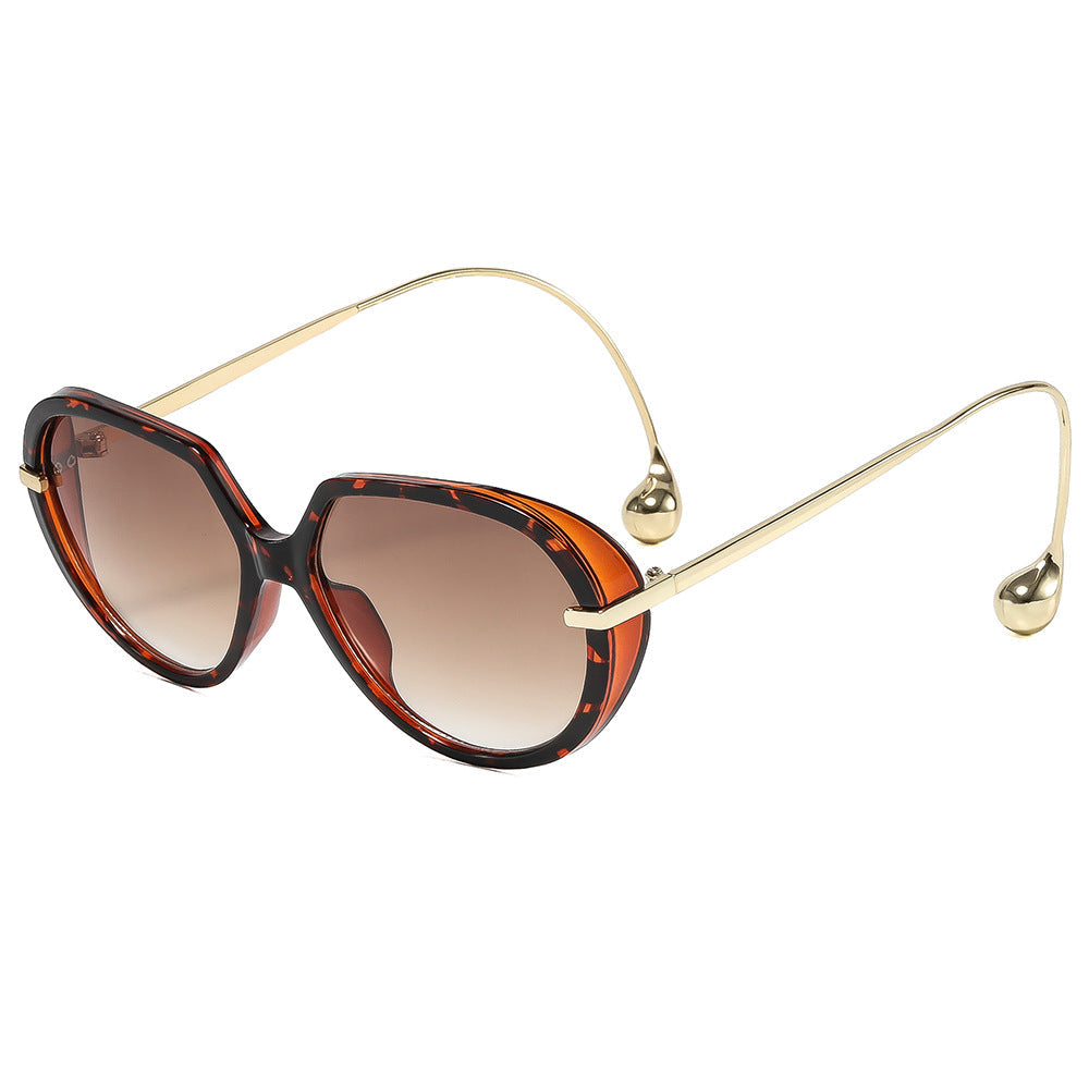 Women's Cat-Eye Sunglasses with Golden Accents and Stylish Frame Kalsten