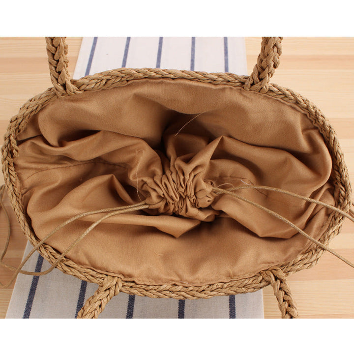 Braided shopping bag with reinforced bottom and long carrying handles Kalsten