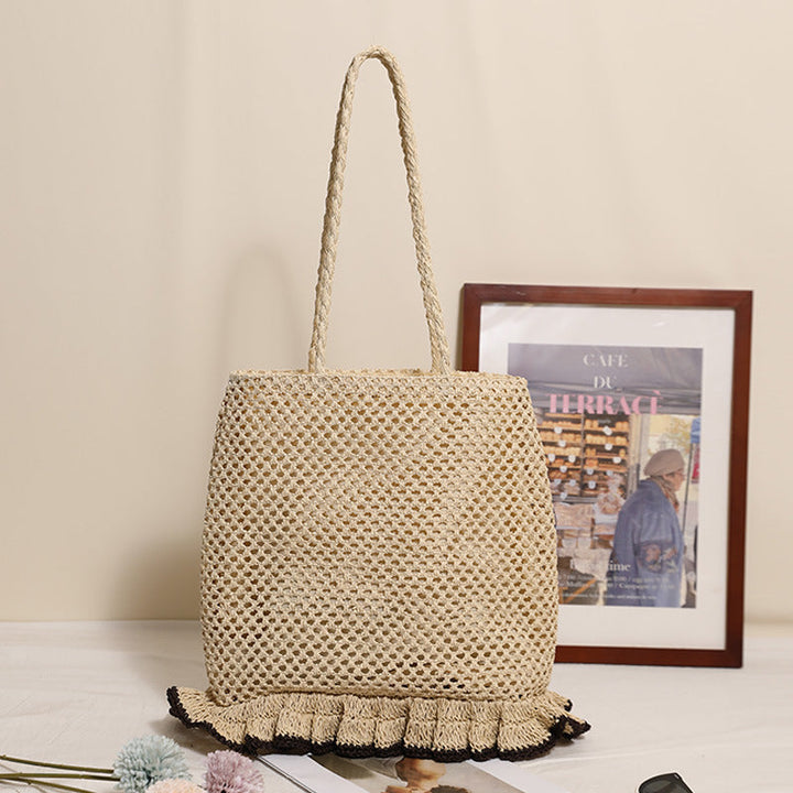 Handcrafted straw bag with fringed hem Kalsten
