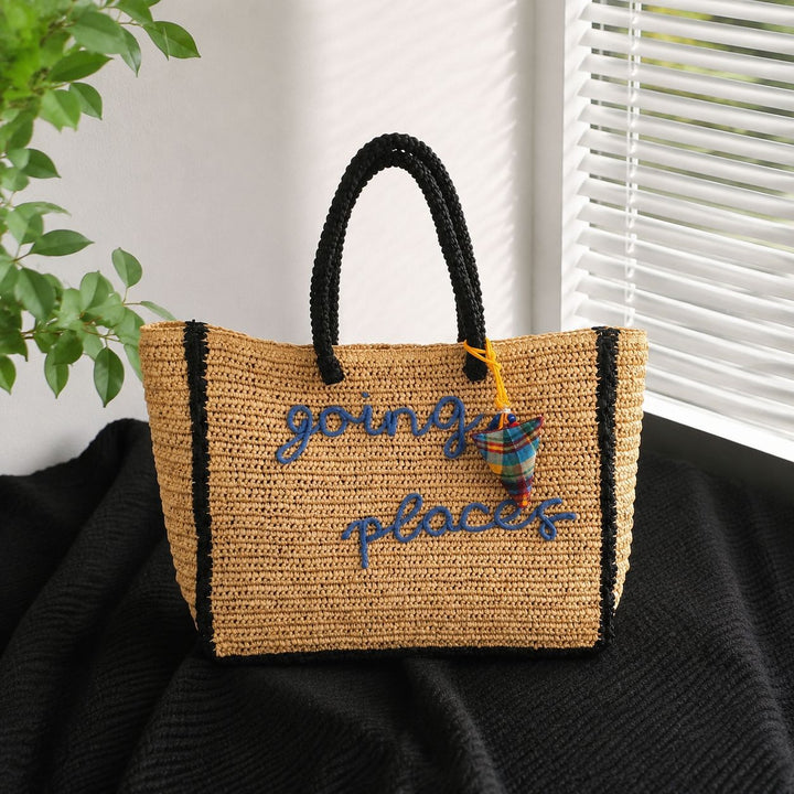 Leisure bag made of woven natural material with colorful pendant Kalsten