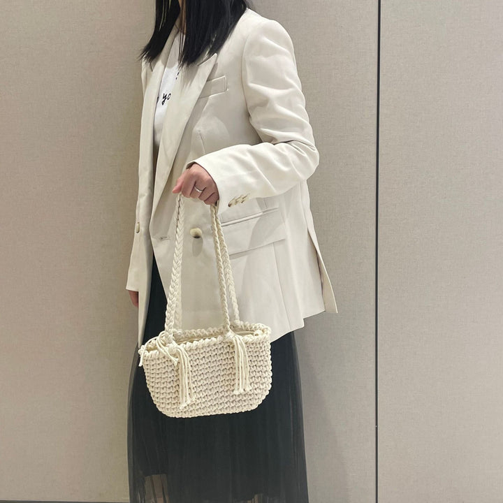 Hand-knotted shoulder bag with decorative pleating technique Kalsten