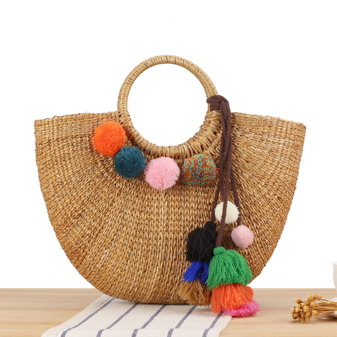Straw handbag with colorful tassels and pom poms Kalsten