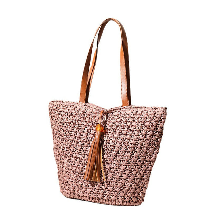 Handcrafted basket bag with fashionable tassel detail Kalsten